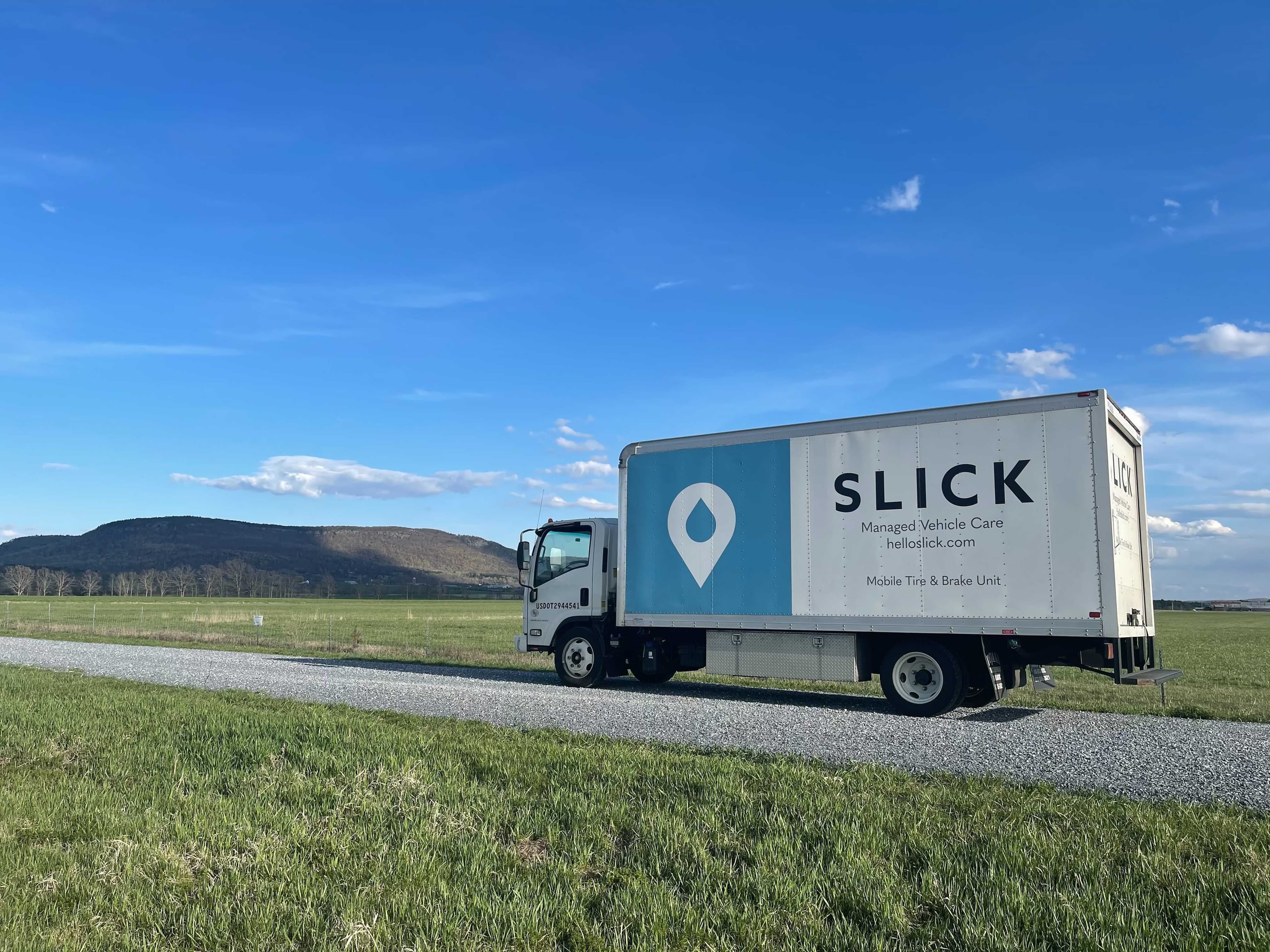 Fleet vehicles being serviced on-yard by Slick technicians