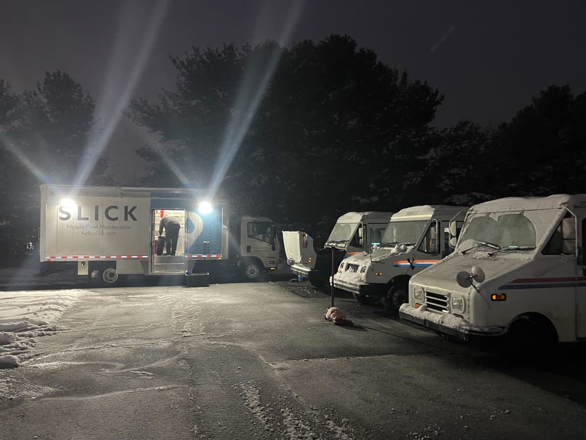 Slick technician performing on-site fleet repair